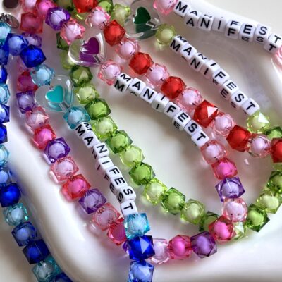 Manifest green phone charm